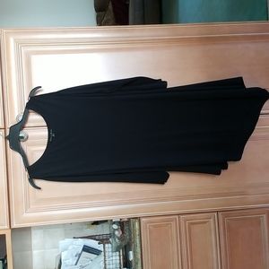 Brand new without tags such a comfortable fabric. Cold shoulder and cut on bias.